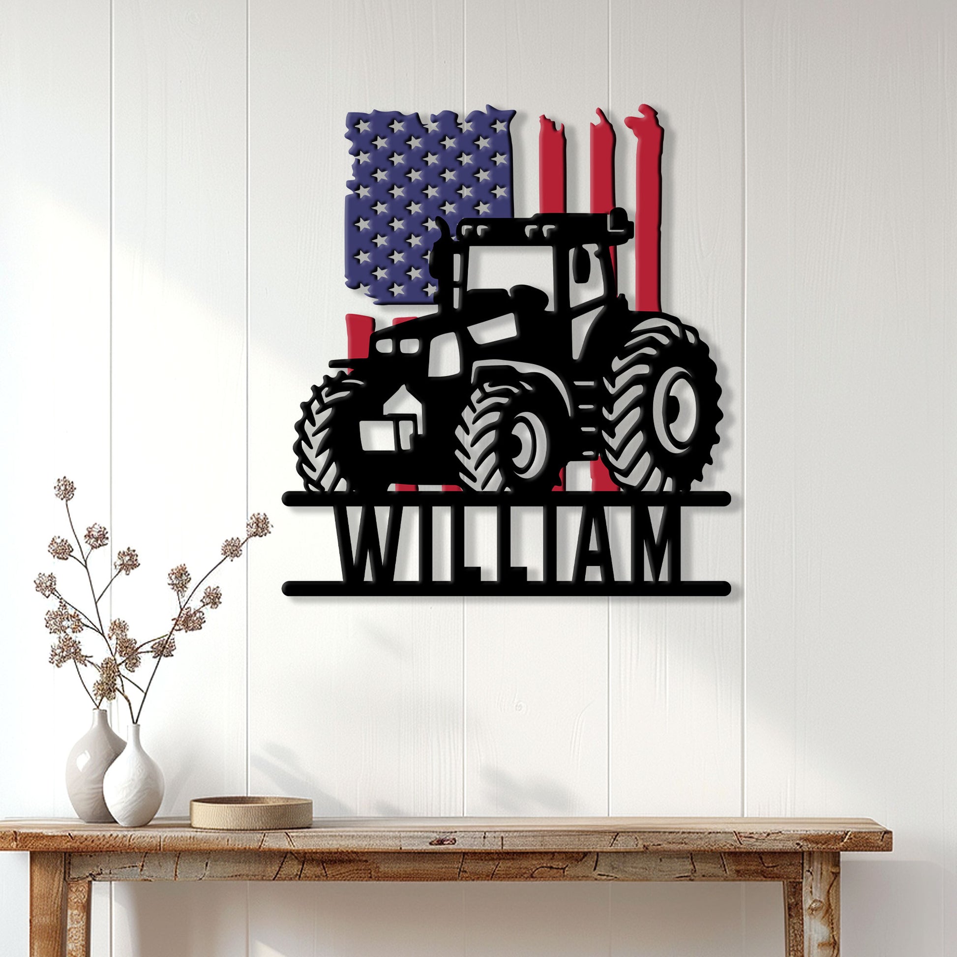 Patriotic farm tractor wall sign displayed on a white paneled wall above a rustic console table
