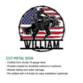 Cut metal rodeo sign featuring a bull rider, American flag design, and bold western silhouette