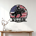Rodeo bull rider wall sign displayed on a white paneled wall in a western-inspired home