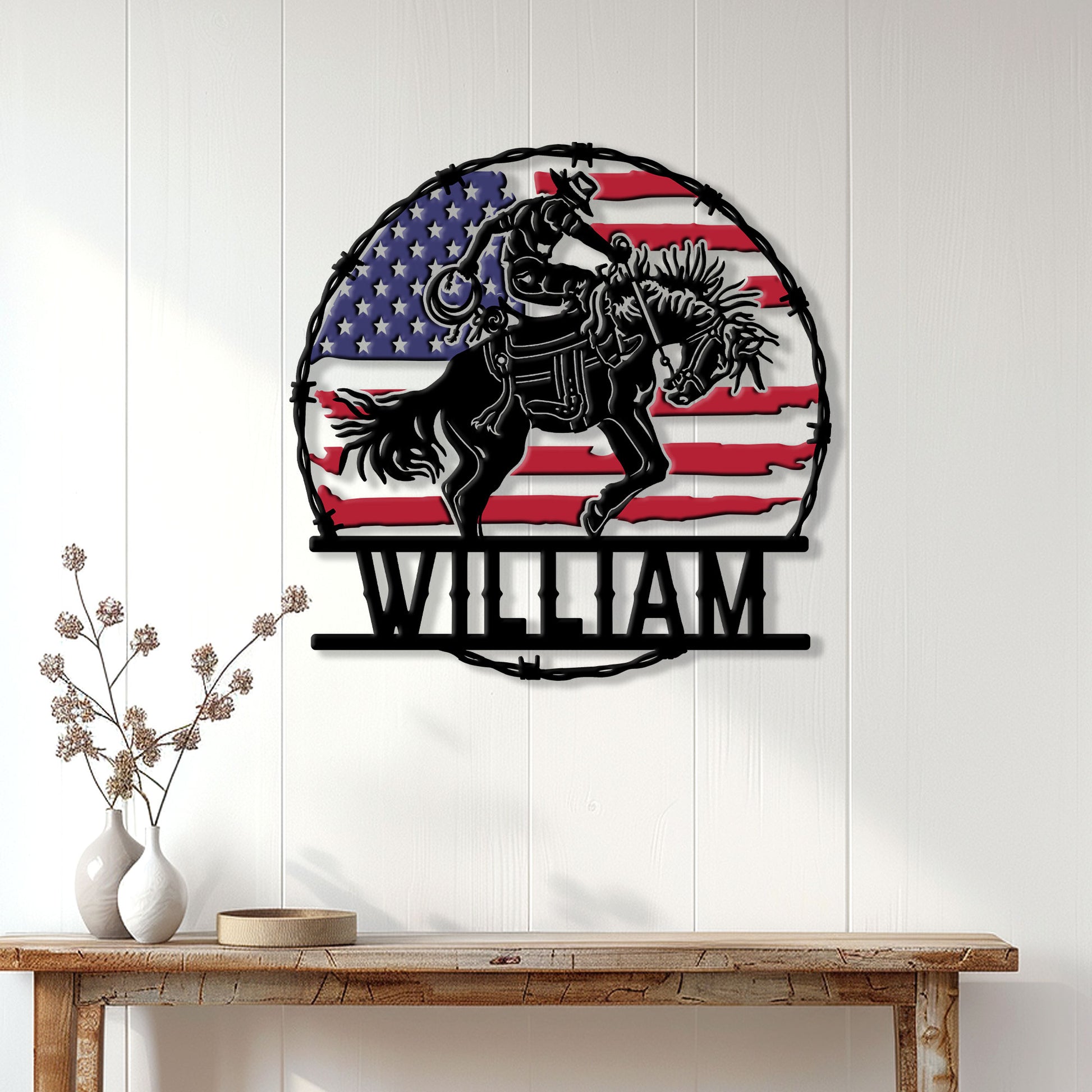 Rodeo bull rider wall sign displayed on a white paneled wall in a western-inspired home