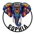 Colorful elephant head metal sign with ornate floral and paisley patterns inside a circular wall decor design
