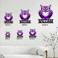 Purple owl metal signs shown in multiple sizes on a contemporary living room wall