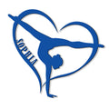 Close-up of a dynamic gymnast silhouette and heart outline featured on a gymnastics wall sign