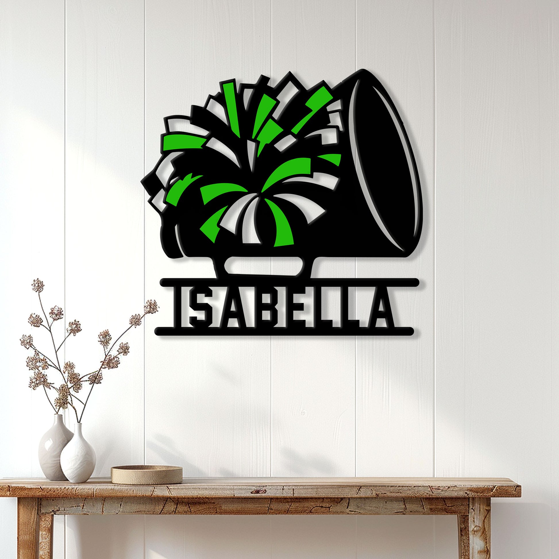 Green cheerleading metal sign featuring a dynamic pom-pom and megaphone design in a home wall display