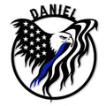 Police eagle metal sign with patriotic stars, stripes, and a blue accent in a circular design