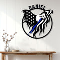 Patriotic police eagle wall sign displayed on a bright paneled wall above a console table