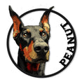 Detailed Doberman portrait cut metal sign with a bold circular frame and striking black, orange, and tan artwork