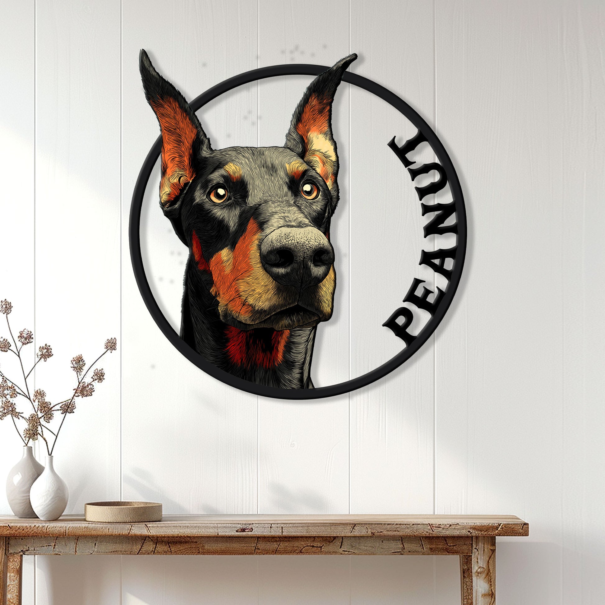 Doberman portrait metal wall sign displayed on white paneled home decor above a wooden console table