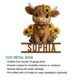 Highland cow cut metal sign featuring a sunflower wreath, bow tie, and farmhouse-inspired artwork