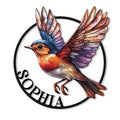 Colorful robin metal sign with raised wings inside a circular frame for bird lover wall decor