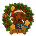 Festive Dachshund metal sign featuring a Santa hat, wrapped gifts, holly, pinecones, berries, and dried oranges
