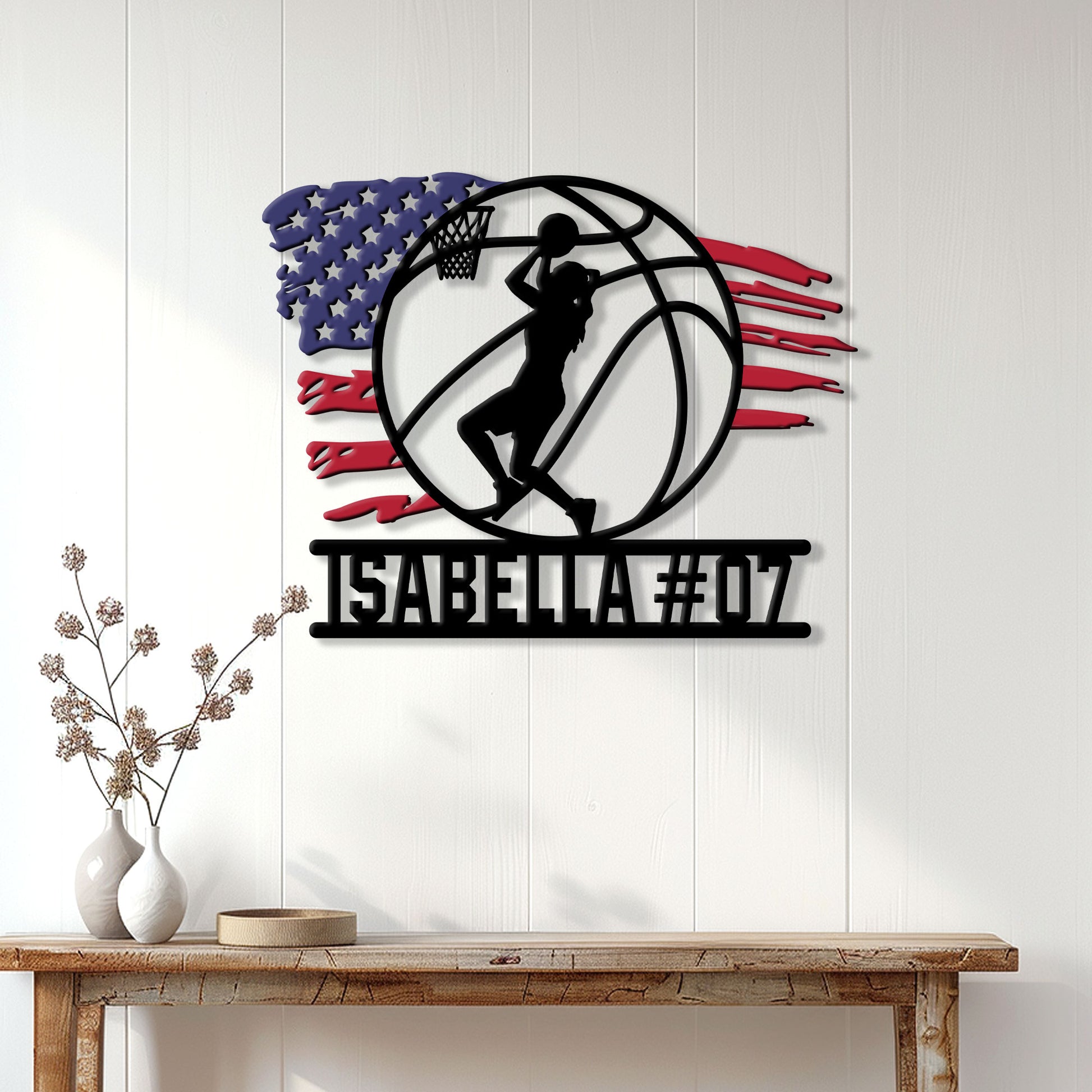 Basketball wall sign displayed above a console table, featuring a female player silhouette and American flag backdrop