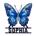 Blue butterfly metal sign with vibrant stained-glass inspired wings and a decorative lower name placeholder