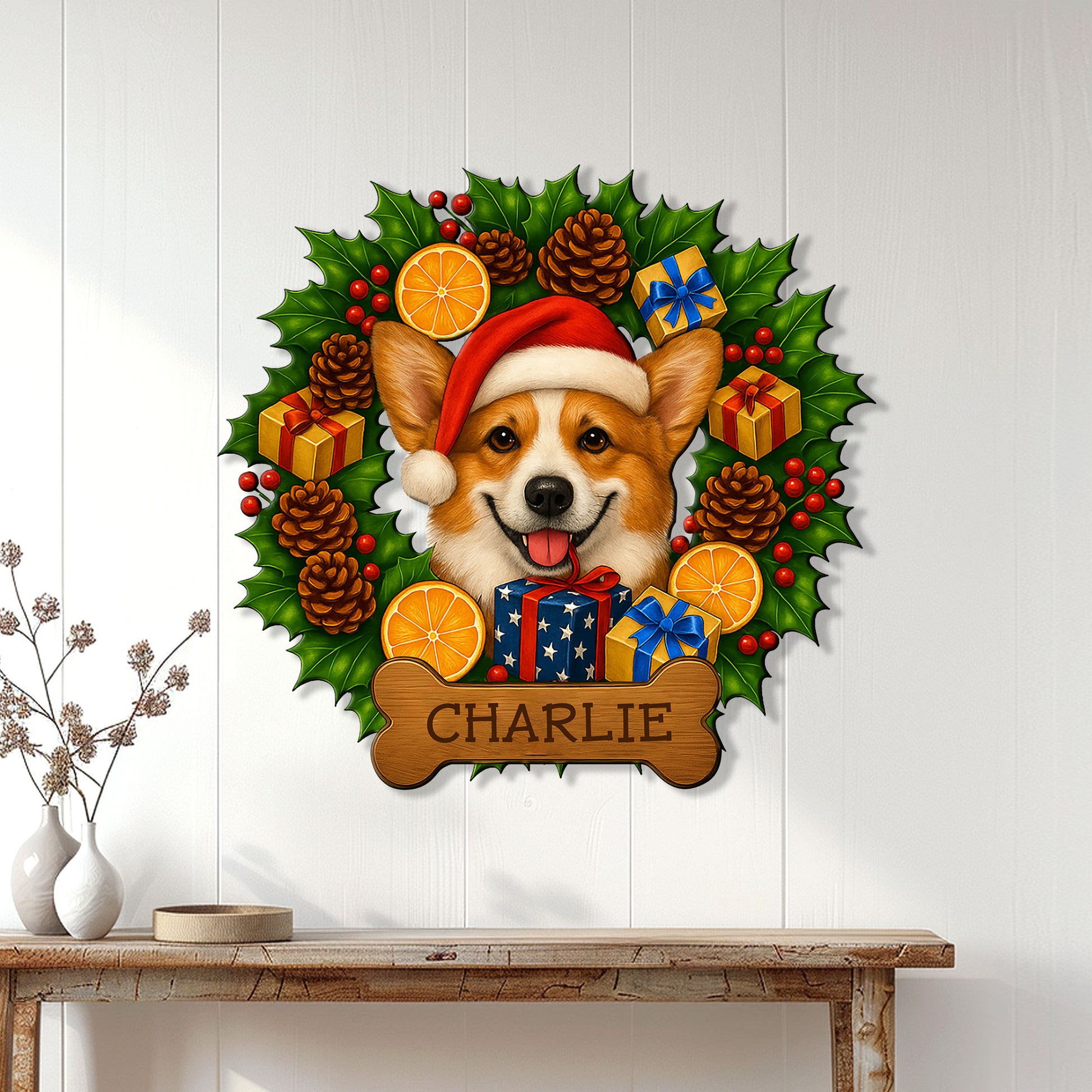 Christmas corgi wall decor displayed on a light wood wall above a console table