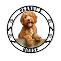 Round Labradoodle metal sign featuring a fluffy brown dog portrait, paw prints, and bone accents