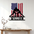 Patriotic wrestler silhouette metal sign displayed as wall decor above a wooden console table