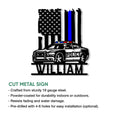 Police metal sign product detail showing a patrol car beneath an American flag and blue stripe design