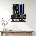 Police car wall sign displayed on a light wood-paneled wall as law enforcement home decor