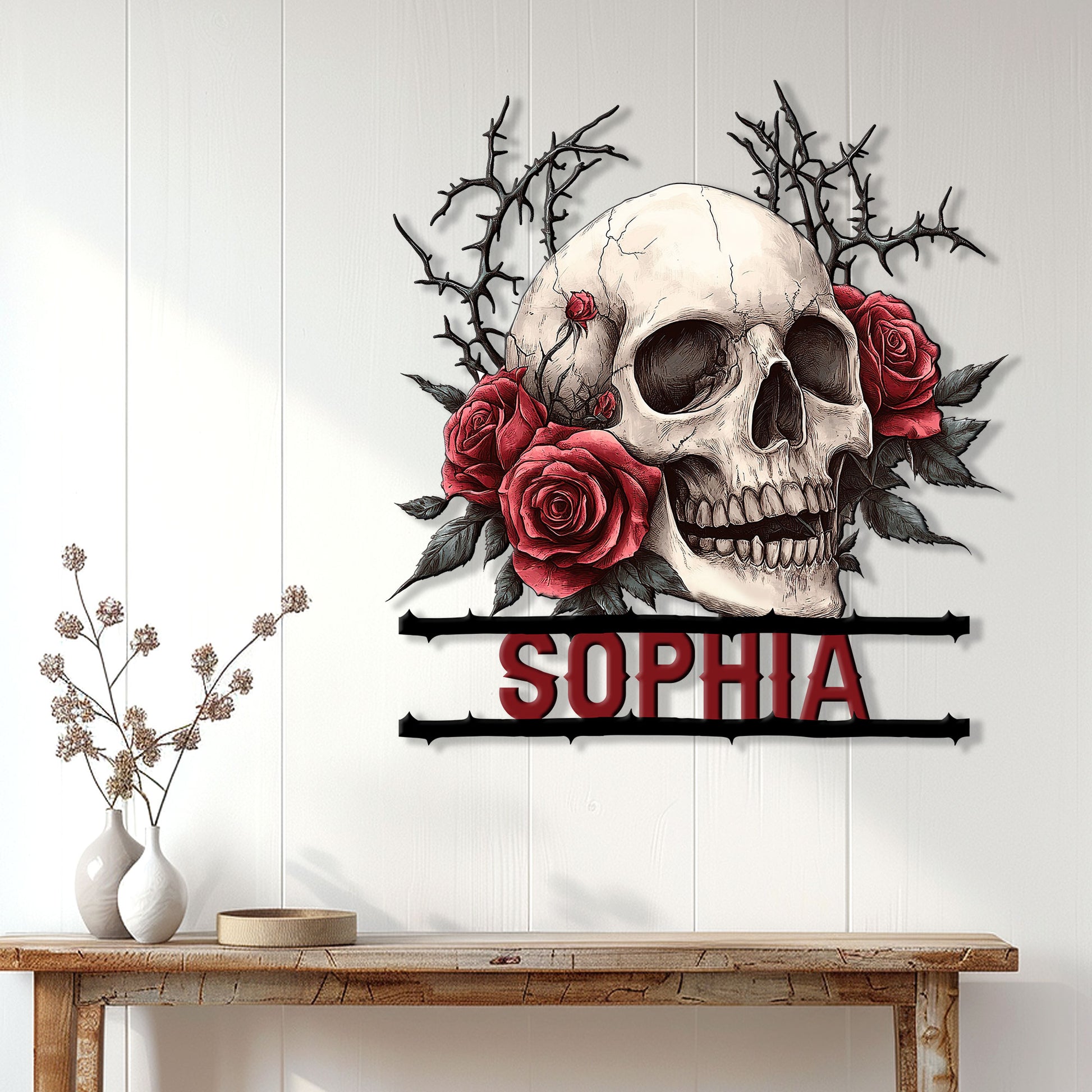 Gothic skull and red rose metal sign displayed on a white paneled wall above a console table