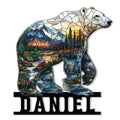 Stained glass style bear metal sign featuring mountain peaks, evergreen trees, rivers, and a sunset landscape