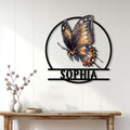 Ornate butterfly wall sign displayed above a console table in a bright home interior