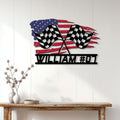 Checkered flag racing wall decor displayed on a light wood-paneled interior wall