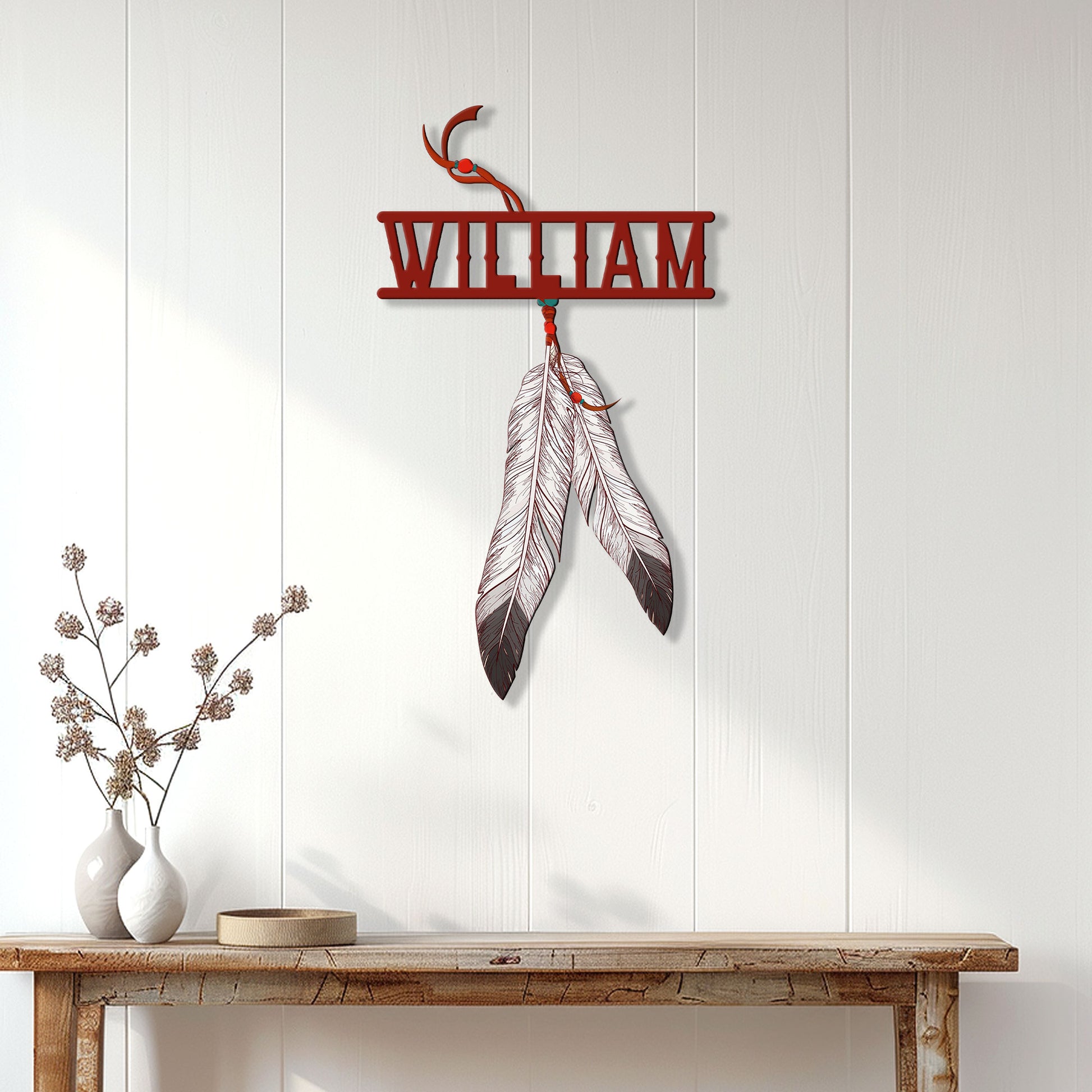 Feathered custom metal wall sign displayed on a bright white wood-paneled entryway