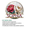 Cut metal flower sign showcasing paired red and ivory blossoms with a decorative circular floral background