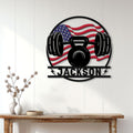 Gym wall decor featuring an American flag weightlifting sign displayed in a home interior