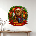 Bengal cat Christmas wall sign displayed above a console table in a bright home interior