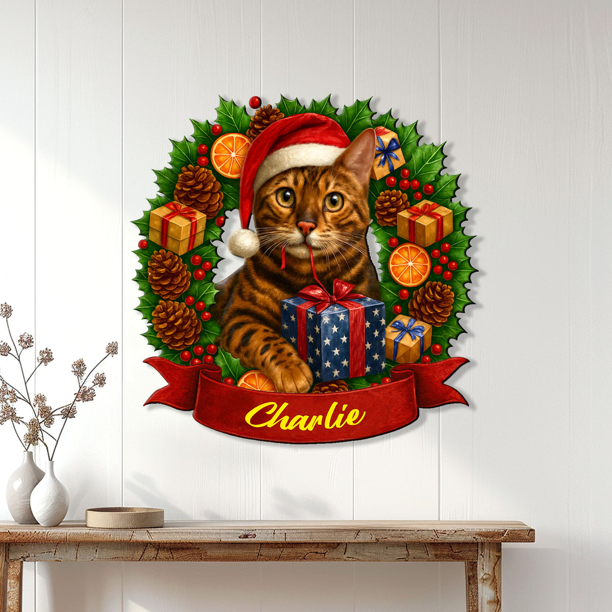 Bengal cat Christmas wall sign displayed above a console table in a bright home interior