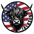 Highland cow metal sign with sweeping horns, bold black line art, and an American flag background