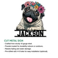 Close-up floral pug metal sign showing a cheerful dog portrait with a bold lower name design