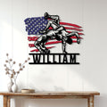 Wrestling wall decor displayed on a white paneled wall, featuring two grapplers over an American flag