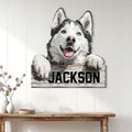 Husky wall sign displayed on white paneled decor above a rustic console table