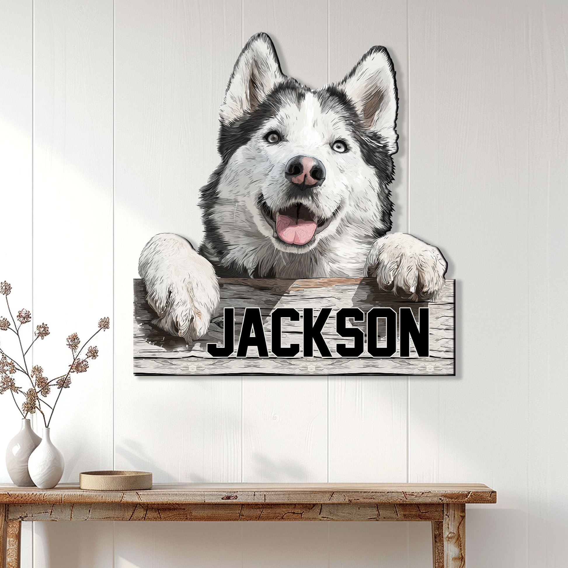 Husky wall sign displayed on white paneled decor above a rustic console table