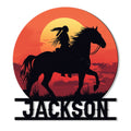 Native American metal sign featuring a rider on horseback in silhouette against a vibrant sunset