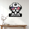 Patriotic Shih Tzu metal wall sign displayed on a bright paneled wall above a console table