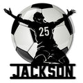 Custom soccer metal sign featuring a celebrating player silhouette in front of a large soccer ball