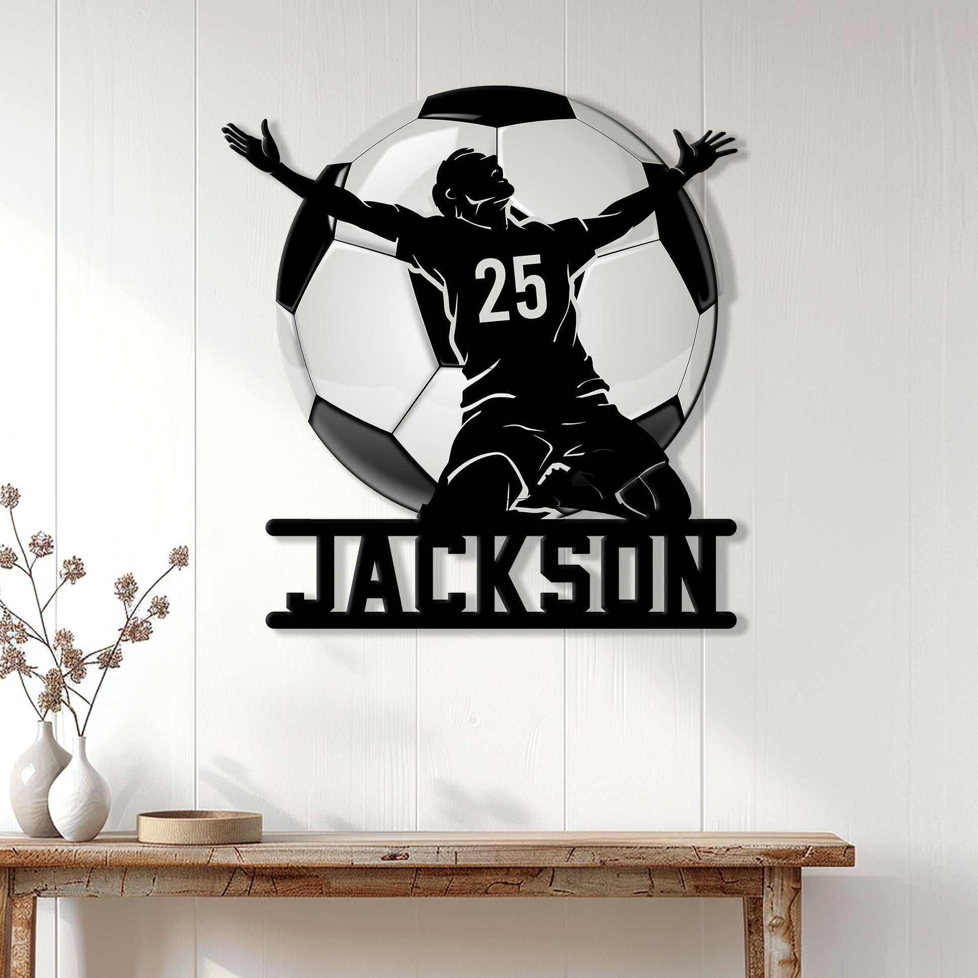 Soccer wall decor displayed on a light paneled wall above a console table