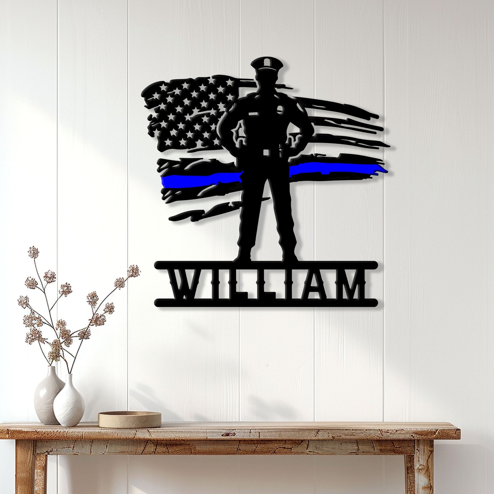 Police tribute metal wall sign displayed on a light wood-paneled wall above a console table