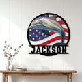 Patriotic dolphin wall sign displayed above a console table in a bright home interior