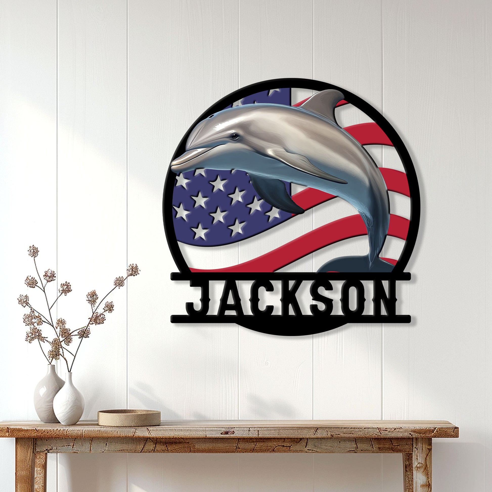 Patriotic dolphin wall sign displayed above a console table in a bright home interior