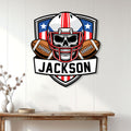 Football metal sign with a skull helmet and footballs displayed as wall decor in a bright home interior
