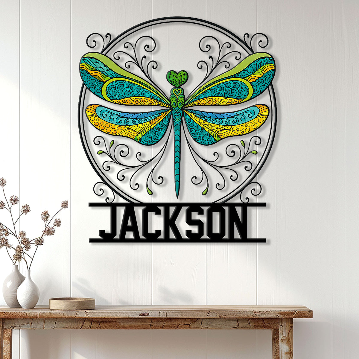 Colorful dragonfly wall sign displayed above a console table in a bright, modern home interior