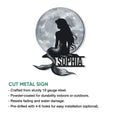 Mermaid wall sign showcasing a moonlit silhouette and shimmering fish-scale tail