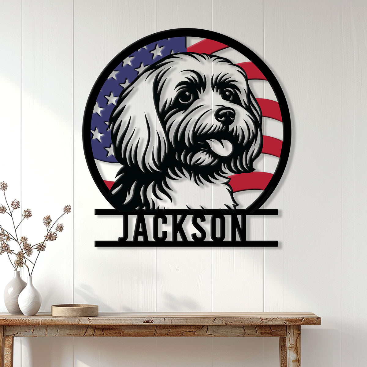 Maltese dog wall sign displayed on white paneling above a console table in a bright home entryway