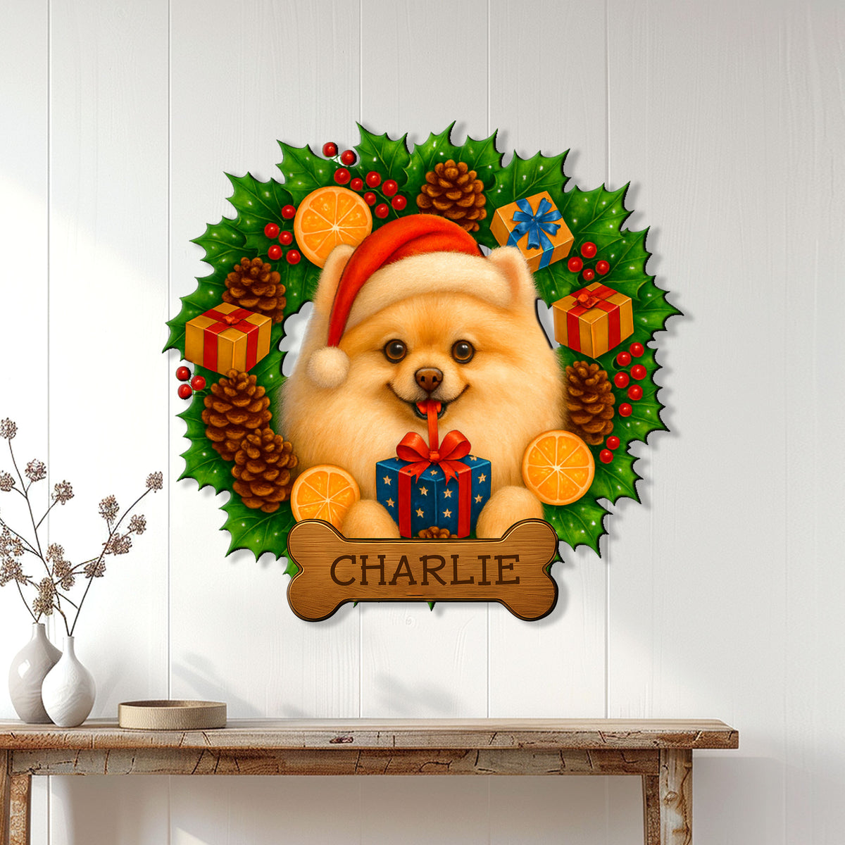 Christmas Pomeranian wall sign displayed on a white paneled wall above a console table