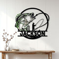 Bass fishing metal wall sign displayed above a console table in a bright home interior