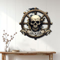 Pirate skull wall sign displayed on a light paneled wall above a wooden console table